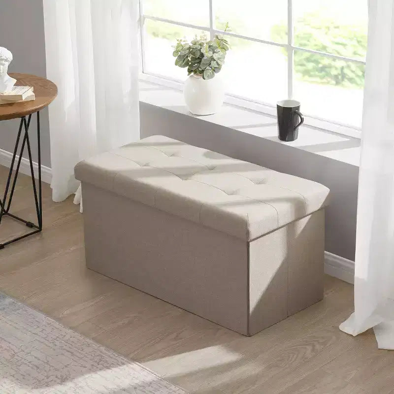 Banc de rangement pliant capitonné en lin de 76 cm